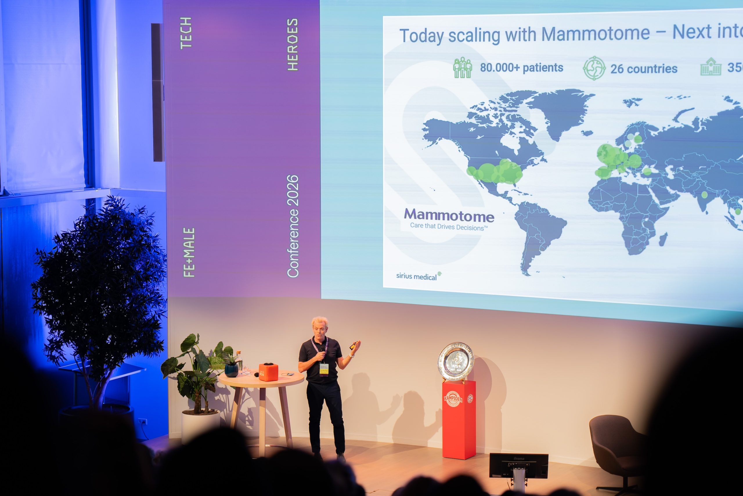 Man presenting global research data