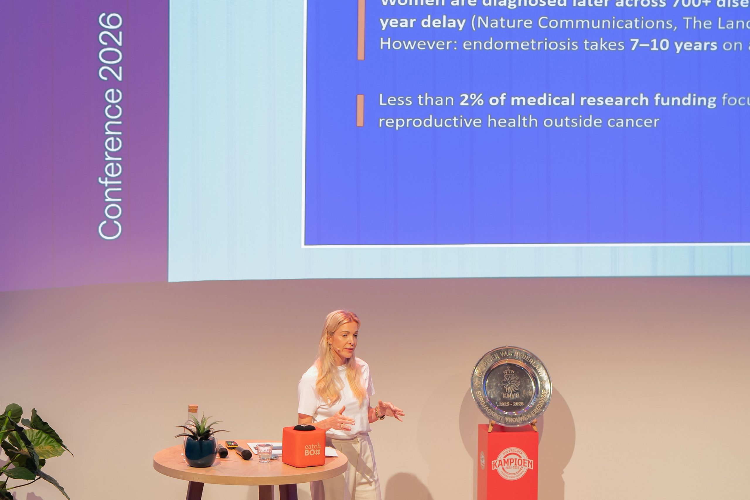 Woman giving presentation with data